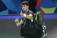 Carlos Alcaraz walks off the court after loss to Grigor Dimitrov in the fourth round of the 2023 Shanghai Masters